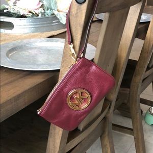 Michael Kors Wristlet in maroon